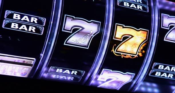 Wide view of live roulette wheel spinning with dealer and multiple camera feeds displayed on kopi interface